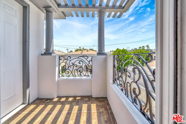 a view of a entryway with wooden floor
