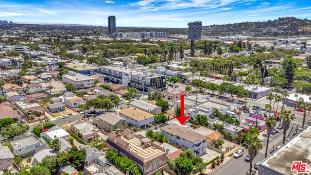 an aerial view of a city with lots of residential buildings