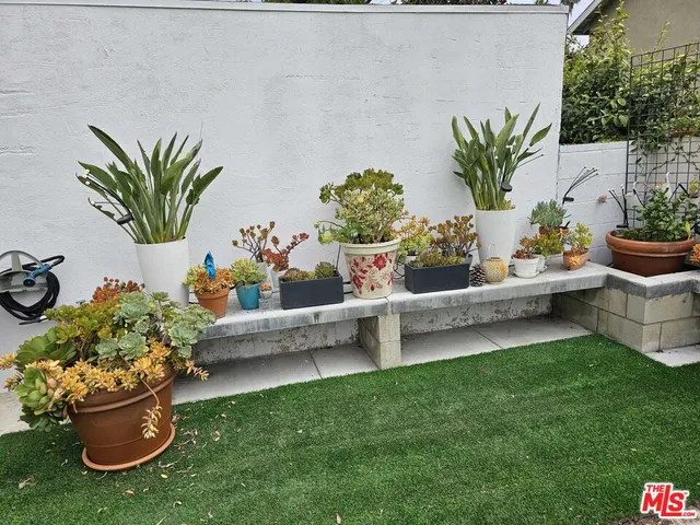 a front view of a house with patio