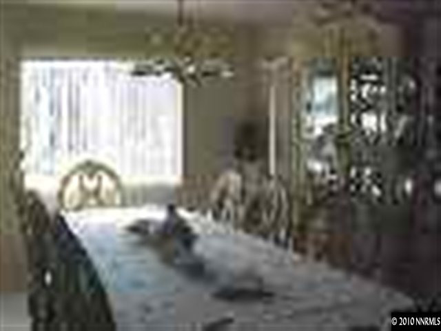 11974 Kernite Street Reno, NV 89506 - Photo 3 of 6 a view of a tree in a yard