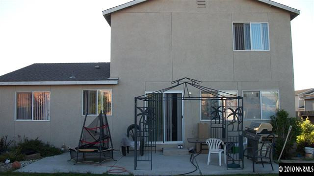 11974 Kernite Street Reno, NV 89506 - Photo 5 of 6 a view of a house with patio