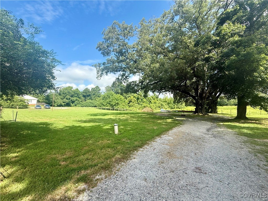 4012 Farmville Road Farmville, VA 23901 - Photo 21 of 27 a view of grassy field with benches and trees all around