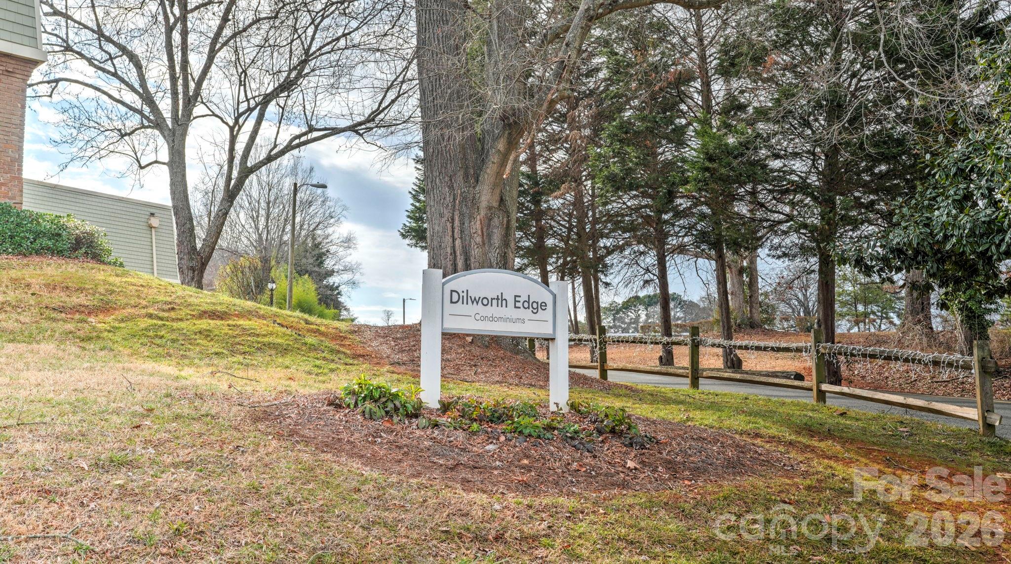 2626 Park Road, Unit B Charlotte, NC 28209 - Photo 30 of 31 a front view of a house with a yard