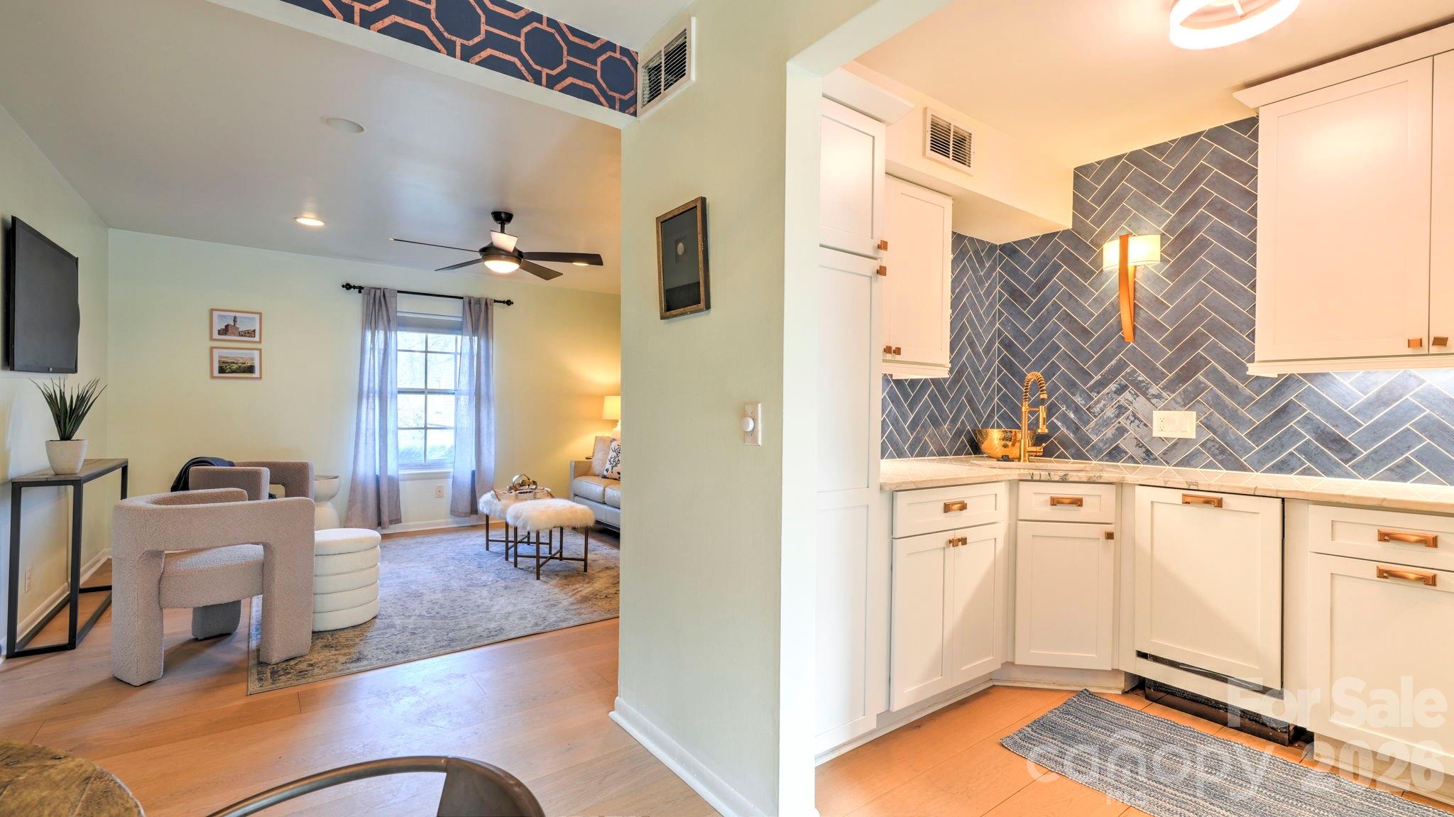 2626 Park Road, Unit B Charlotte, NC 28209 - Photo 3 of 31 a very nice looking living room with a couch