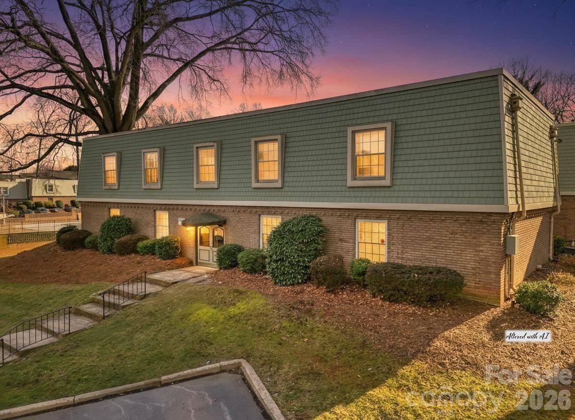 2626 Park Road, Unit B Charlotte, NC 28209 - Photo 31 of 31 a front view of a house with garden