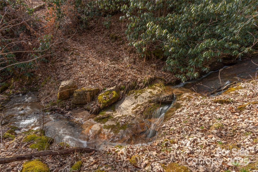1 Tilley Creek Road Cullowhee, NC 28723 - Photo 6 of 11 a view of a wooden fence of a building