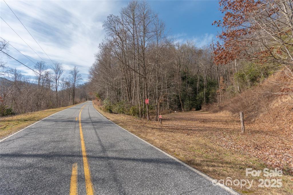 1 Tilley Creek Road Cullowhee, NC 28723 - Photo 9 of 11 a view of a yard with trees