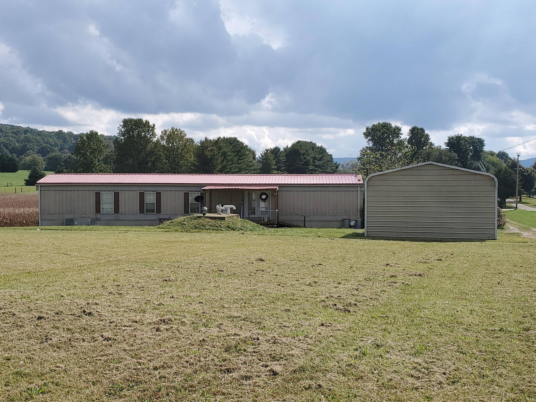 202 Baker Road Morrison, TN 37357 - Photo 11 of 13 a front view of a house with a yard