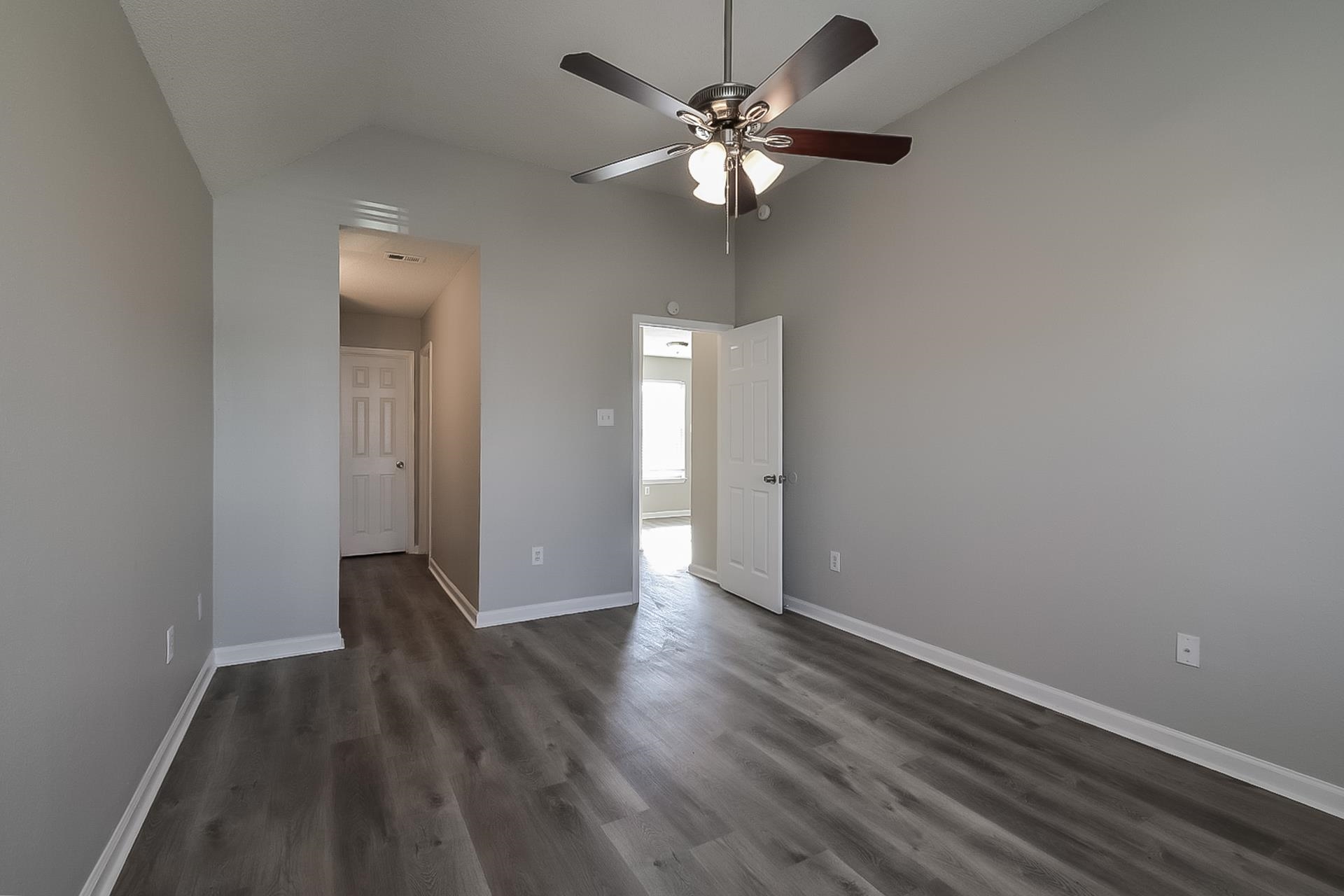 4539 Longtree Avenue Memphis, TN 38128 - Photo 7 of 16 wooden floor in an empty room with a window