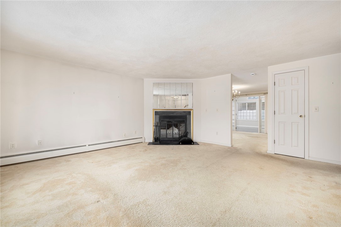 2 Eagle Run, Unit A Warwick, RI 02818 - Photo 3 of 27 Wood burning fireplace