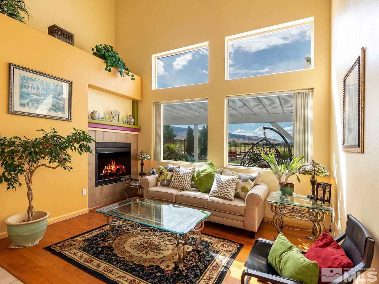 10675 Silver Cliff Way Reno, NV 89521 - Photo 5 of 16 a living room with furniture and a fireplace
