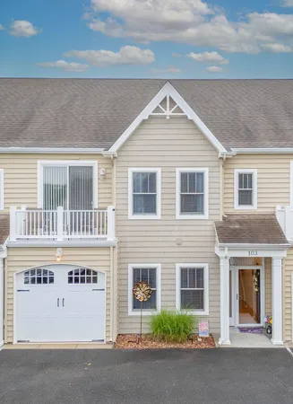 an aerial view of a house with outdoor space