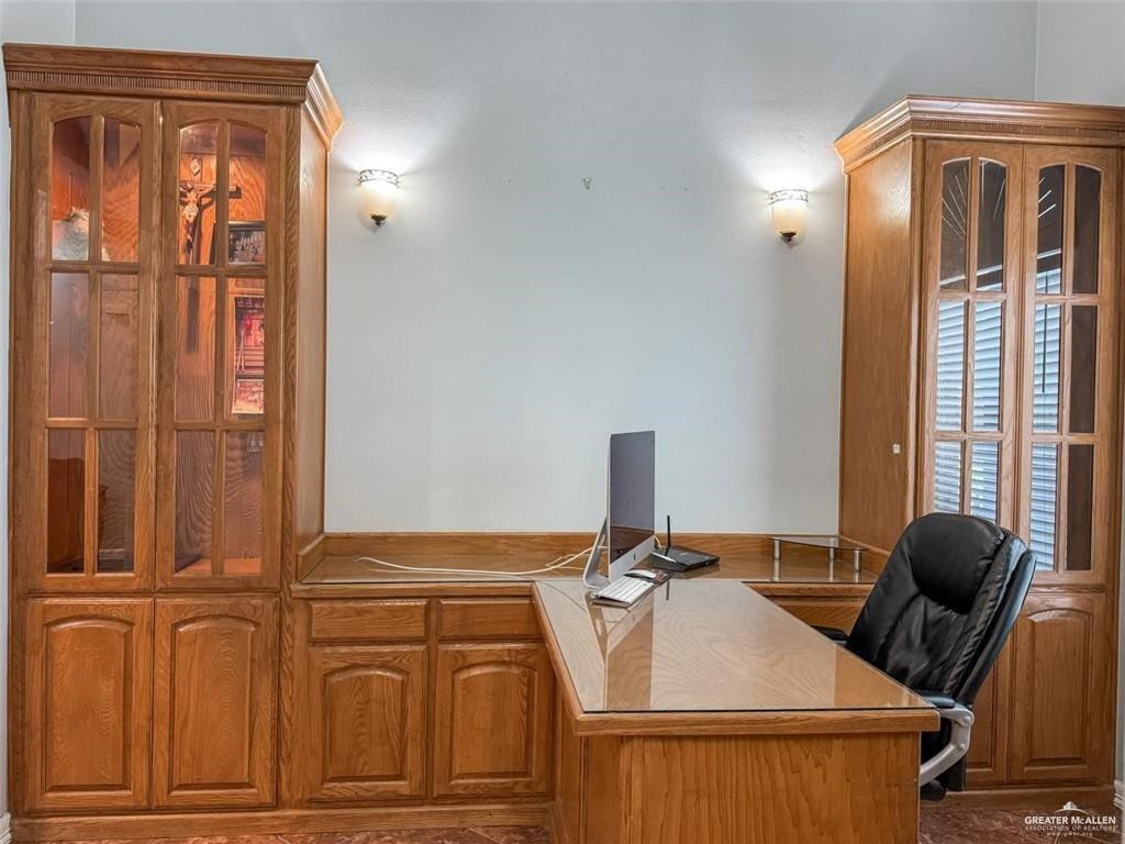 120 South Retama Lane Weslaco, TX 78596 - Photo 15 of 19 a bathroom with a sink and a mirror