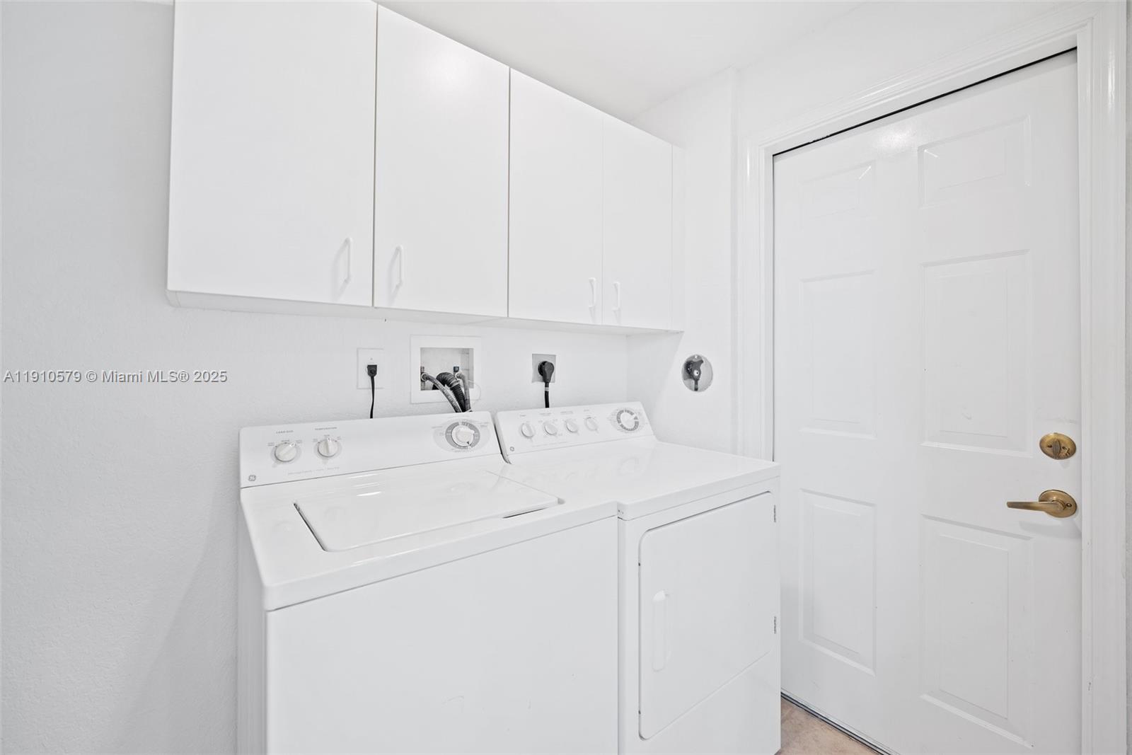 18746 Southwest 27th Court Miramar, FL 33029 - Photo 9 of 35 a utility room with dryer and washer