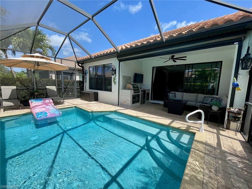 8328 Lucello Terrace North Naples, FL 34114 - Photo 4 of 22 a outdoor living space with patio furniture
