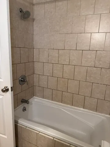 a bathroom with a bathtub
