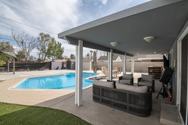 a living room with furniture and a view of living room