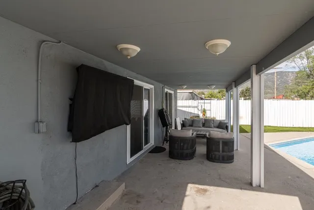 a lobby with furniture and outdoor view