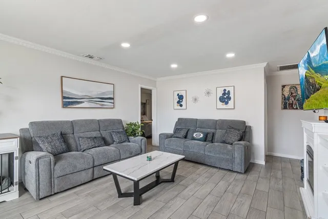 a living room with furniture and a couch