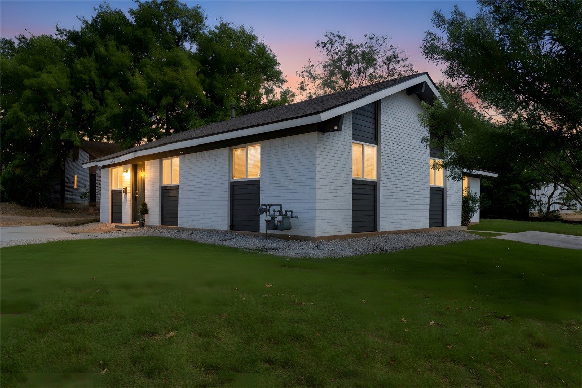 a backyard of a house with lots of green space