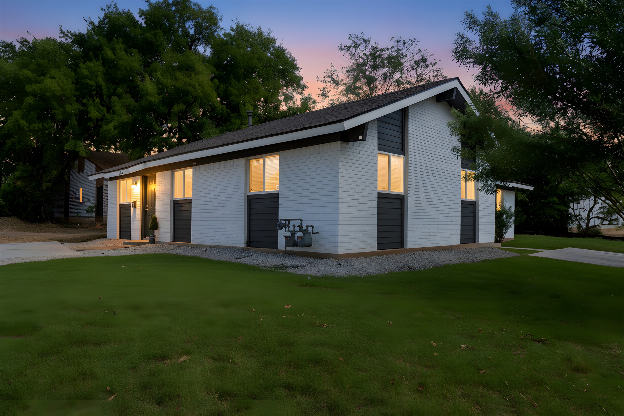 4913 Hawk Cove, Unit B Austin, TX 78745 - Photo 1 of 1 a backyard of a house with lots of green space