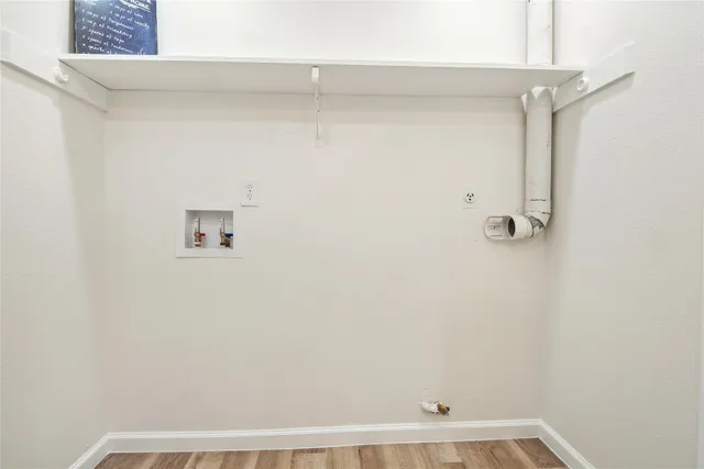 a view of small space with racks on the wall