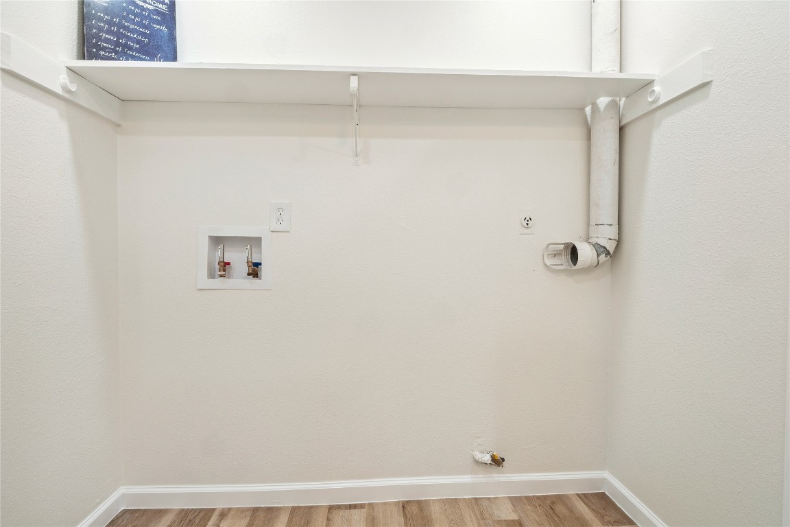 4913 Hawk Cove, Unit B Austin, TX 78745 - Photo 11 of 21 a view of small space with racks on the wall