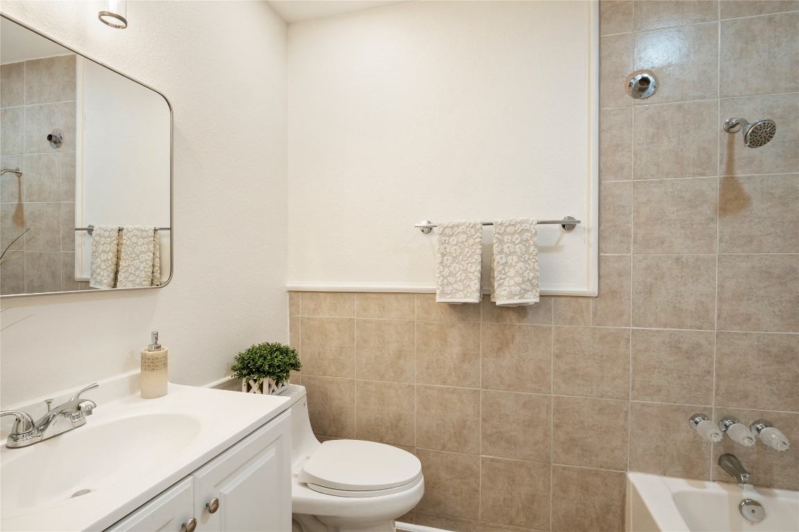 4913 Hawk Cove, Unit B Austin, TX 78745 - Photo 17 of 21 a bathroom with a sink toilet and shower