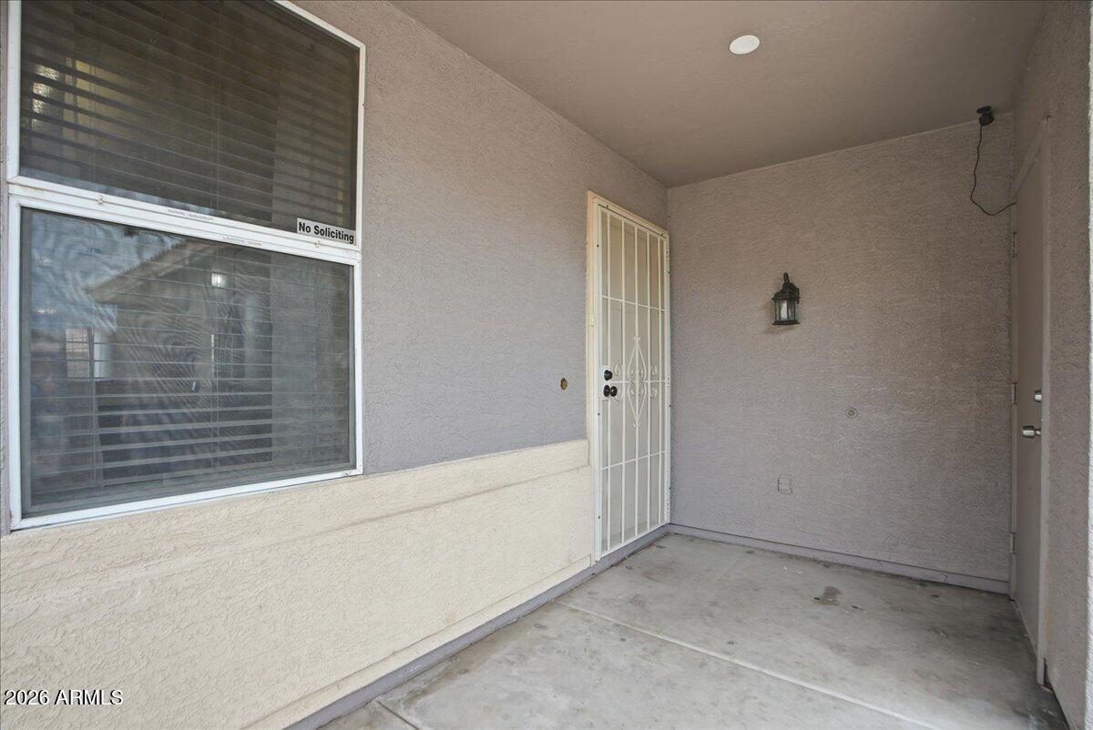 1825 West Renaissance Avenue Apache Junction, AZ 85120 - Photo 3 of 23 a view of an empty room