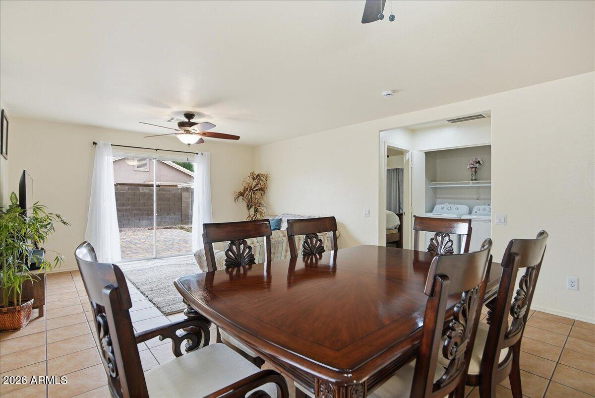 1825 West Renaissance Avenue Apache Junction, AZ 85120 - Photo 8 of 23 a view of a dining room with furniture