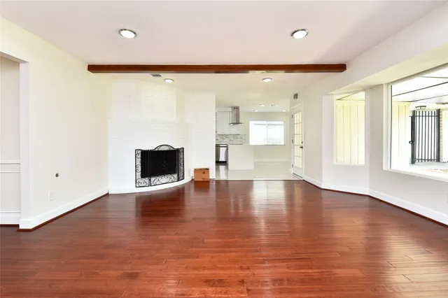a kitchen with a stove top oven sink and cabinets