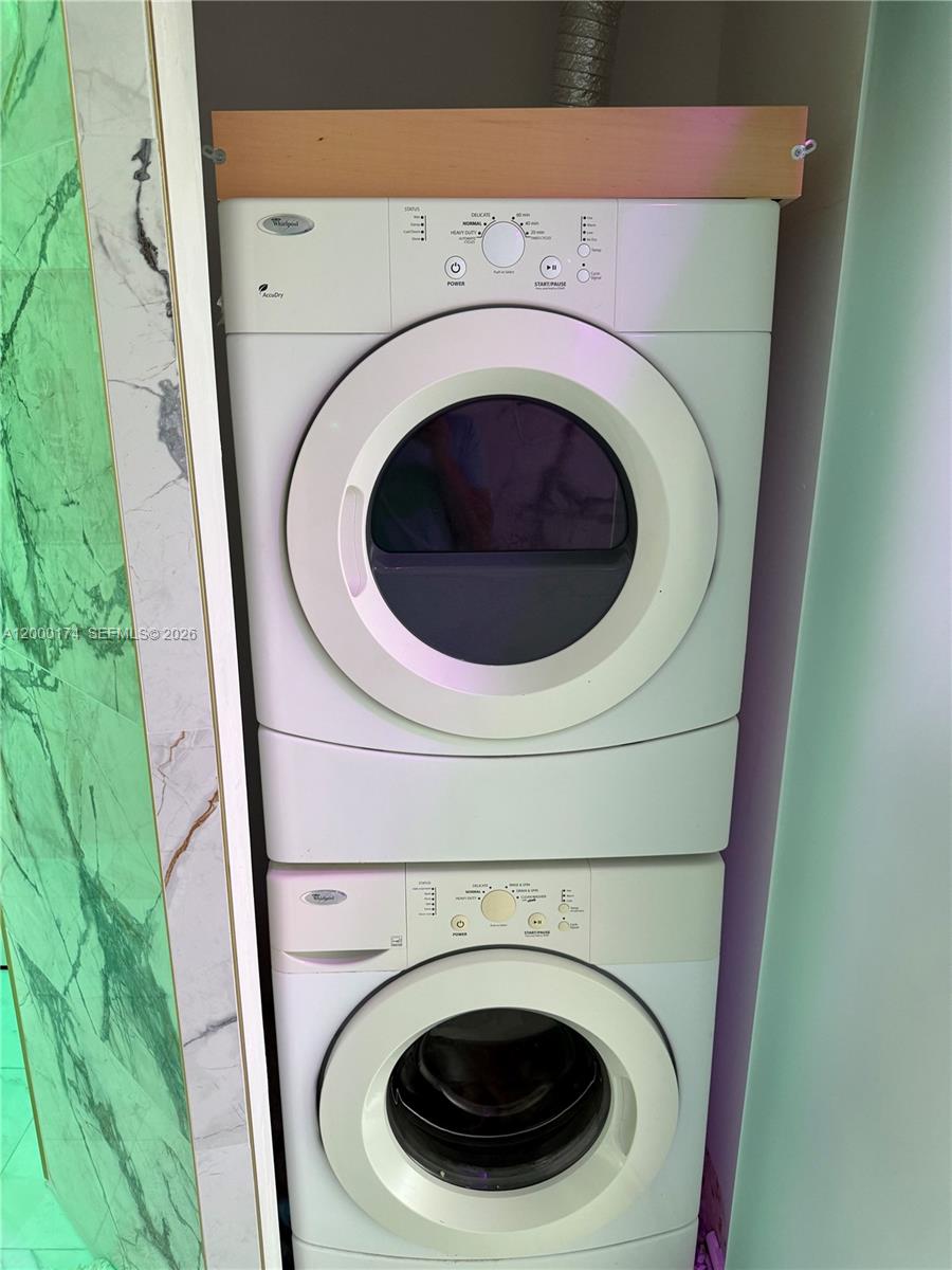 601 Northeast 23rd Street, Unit 903 Miami, FL 33137 - Photo 30 of 61 a utility room with dryer and washer