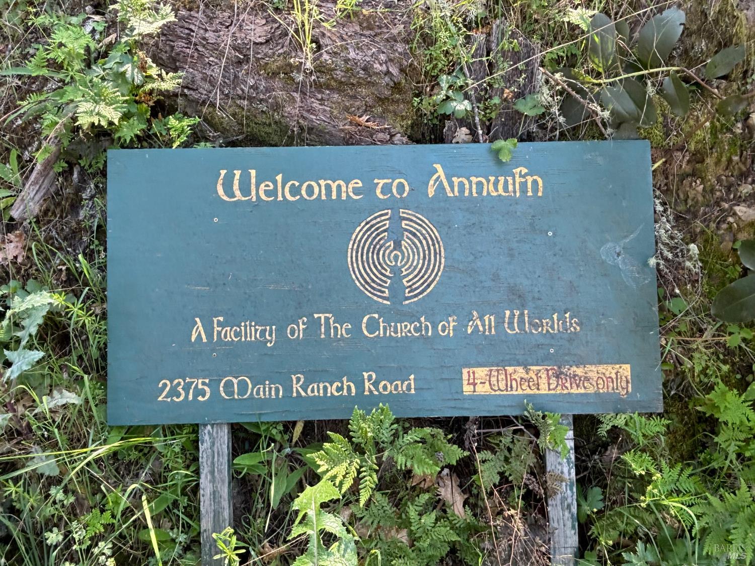 3701 Radical Ridge Road Redwood Valley, CA 95470 - Photo 22 of 38 a sign broad on a brick wall