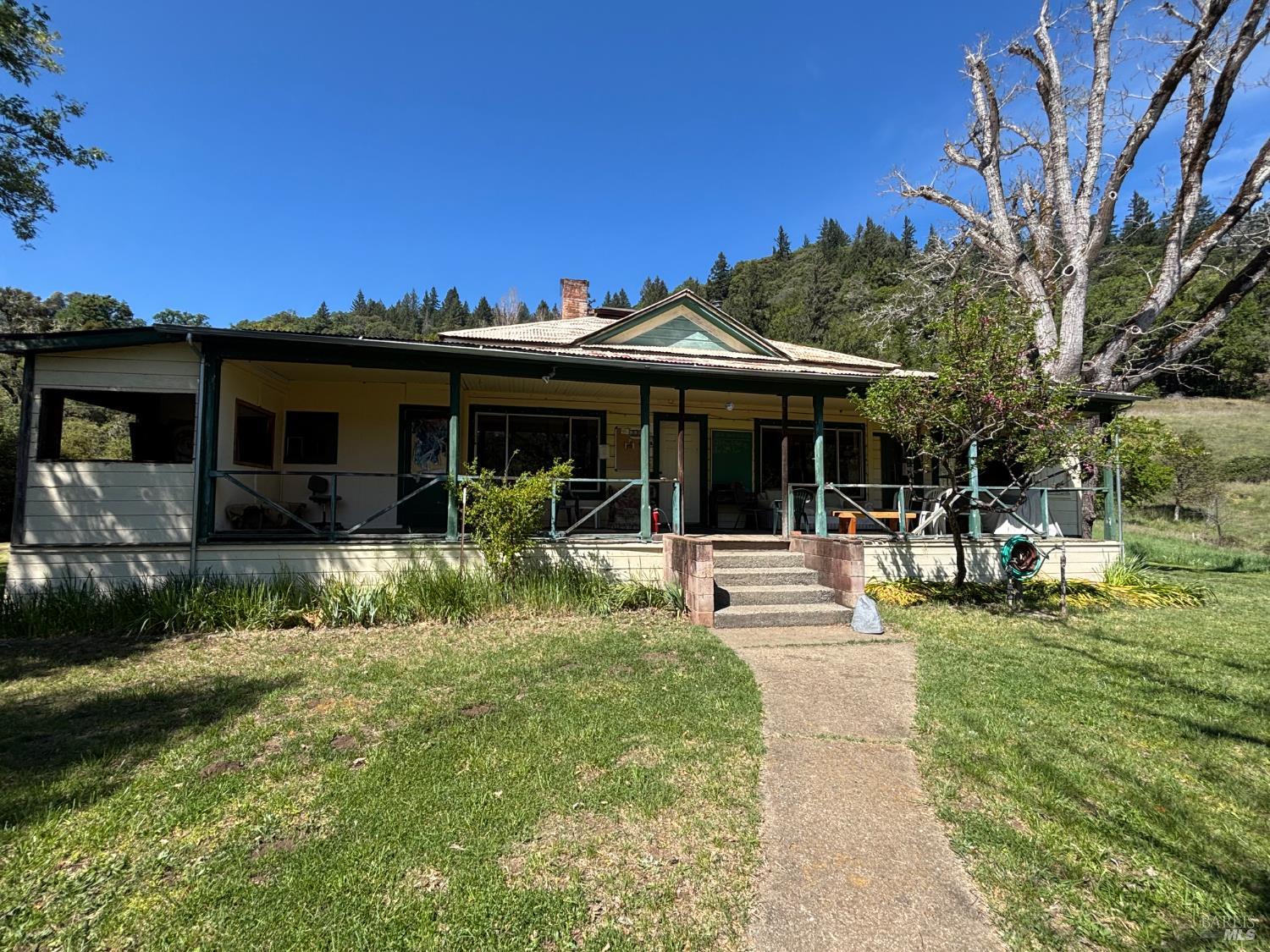 3701 Radical Ridge Road Redwood Valley, CA 95470 - Photo 24 of 38 a view of a house with sitting area and garden