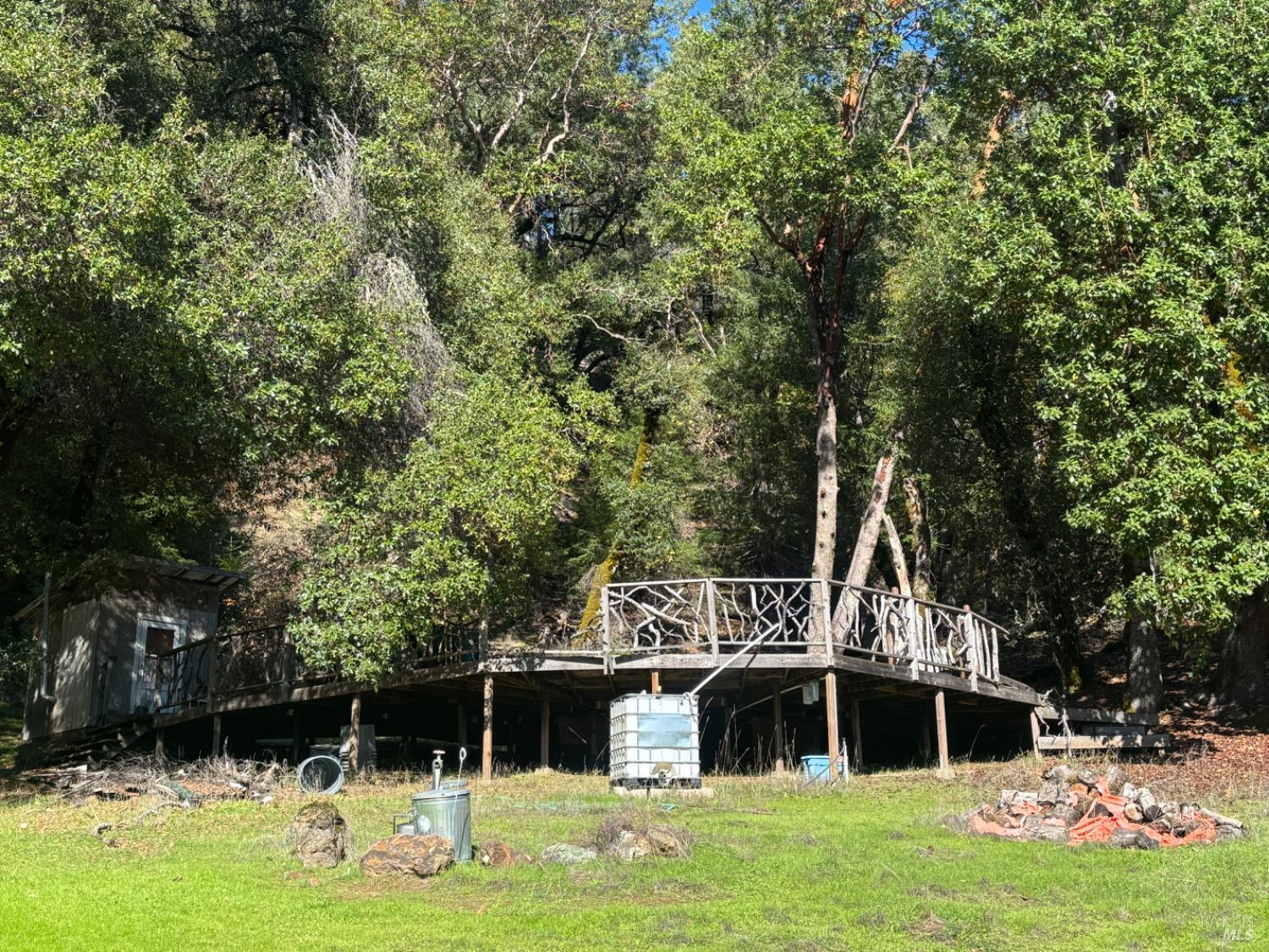 3701 Radical Ridge Road Redwood Valley, CA 95470 - Photo 30 of 34 a front view of a house with garden