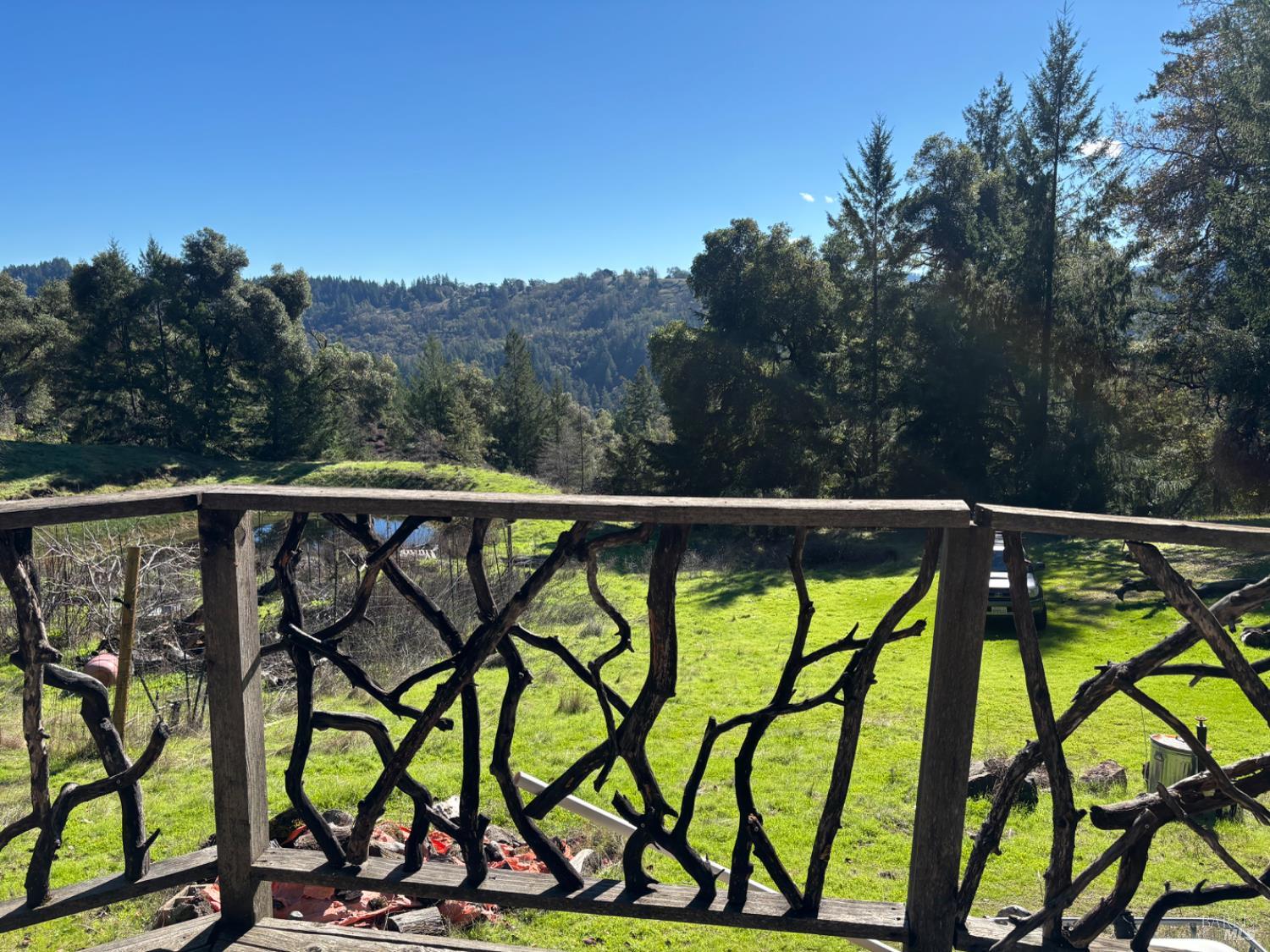 3701 Radical Ridge Road Redwood Valley, CA 95470 - Photo 31 of 34 a view of a street with trees in the background