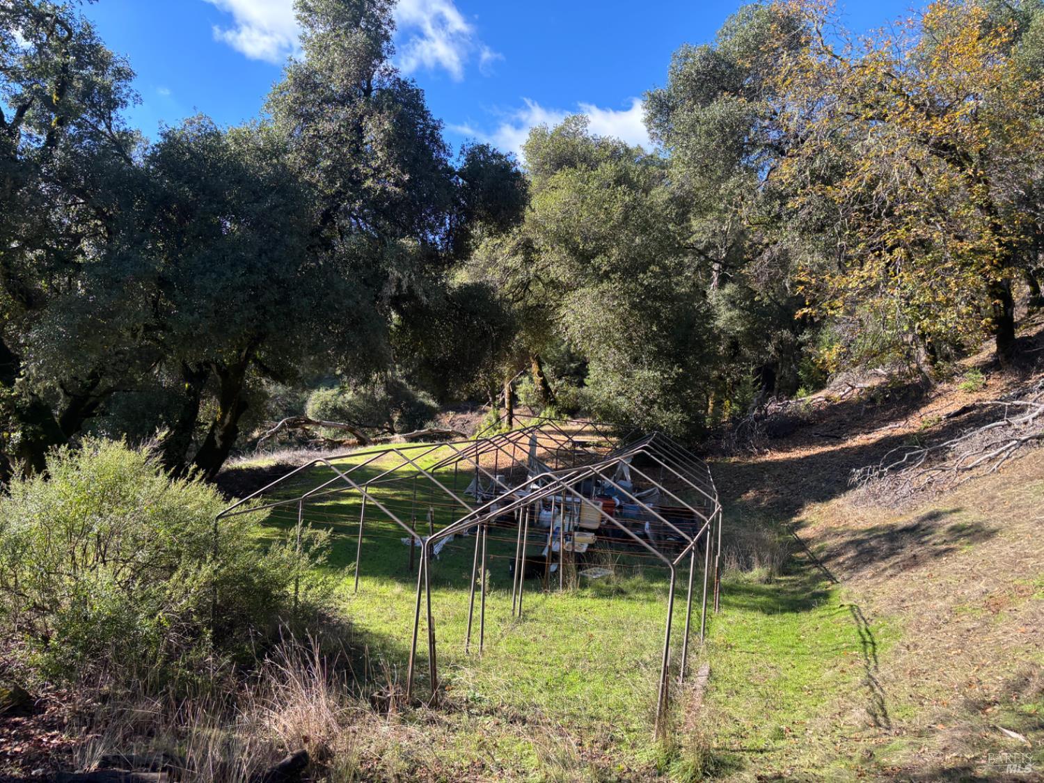 3701 Radical Ridge Road Redwood Valley, CA 95470 - Photo 32 of 34 a view of a house with a yard