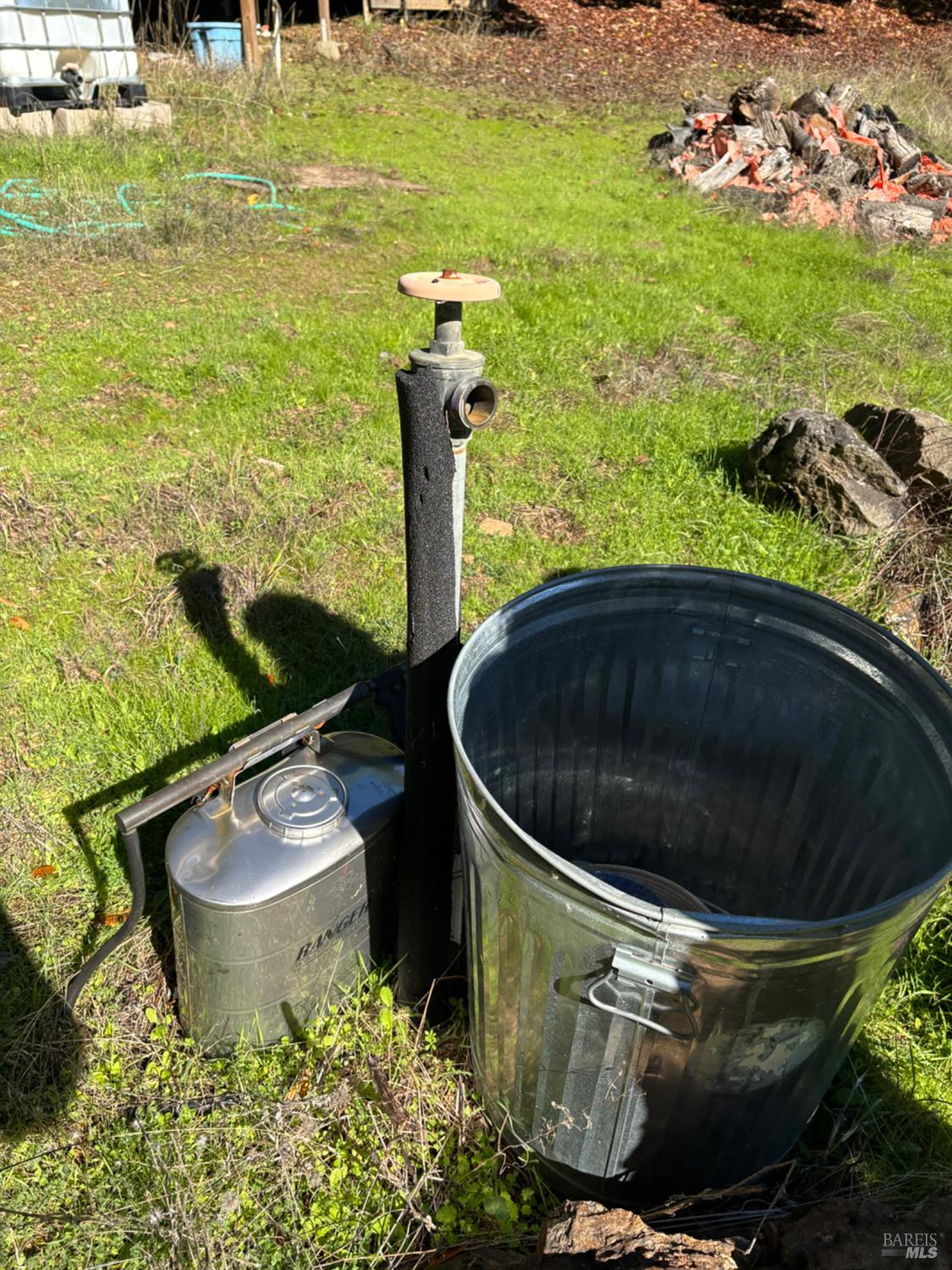 3701 Radical Ridge Road Redwood Valley, CA 95470 - Photo 37 of 38 a view of a swimming pool with a yard and plants