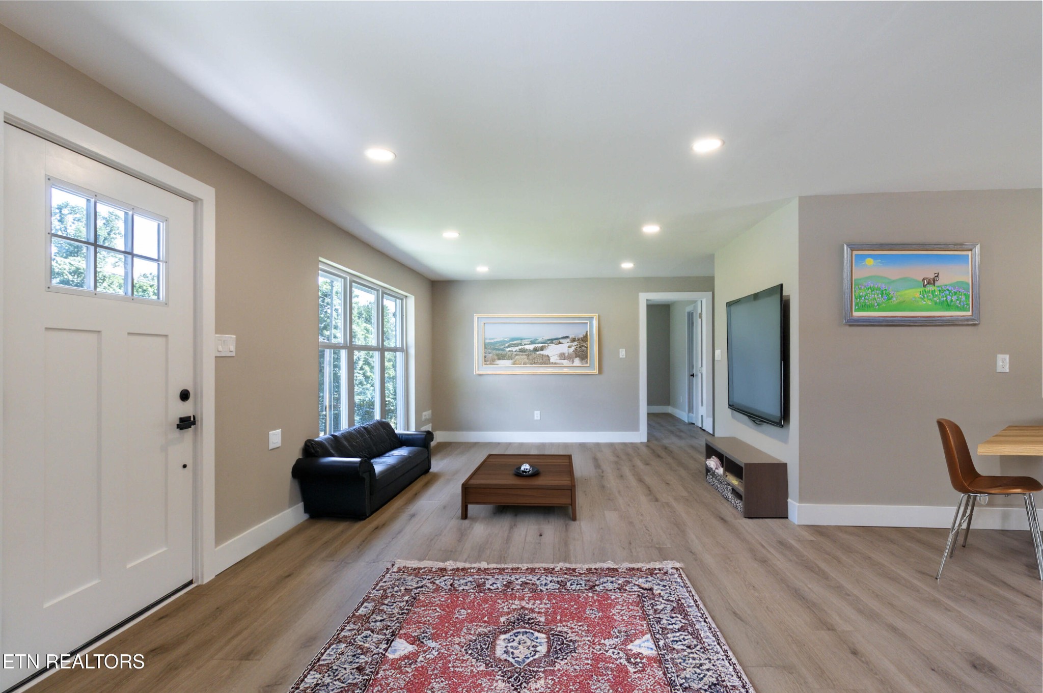 505 Foust Carney Road Powell, TN 37849 - Photo 14 of 40 a living room with furniture and a rug