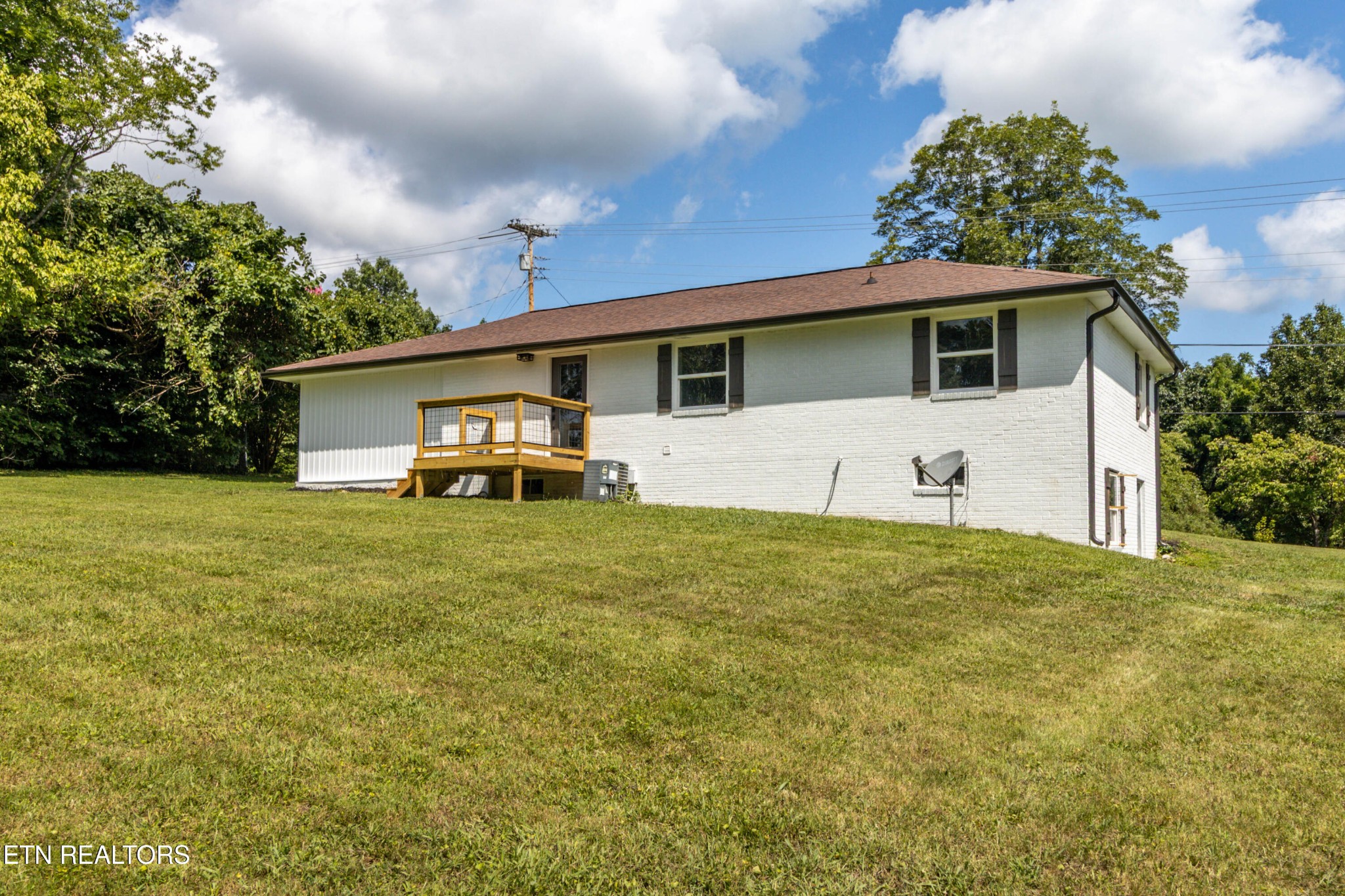 505 Foust Carney Road Powell, TN 37849 - Photo 33 of 40 a front view of a house with garden