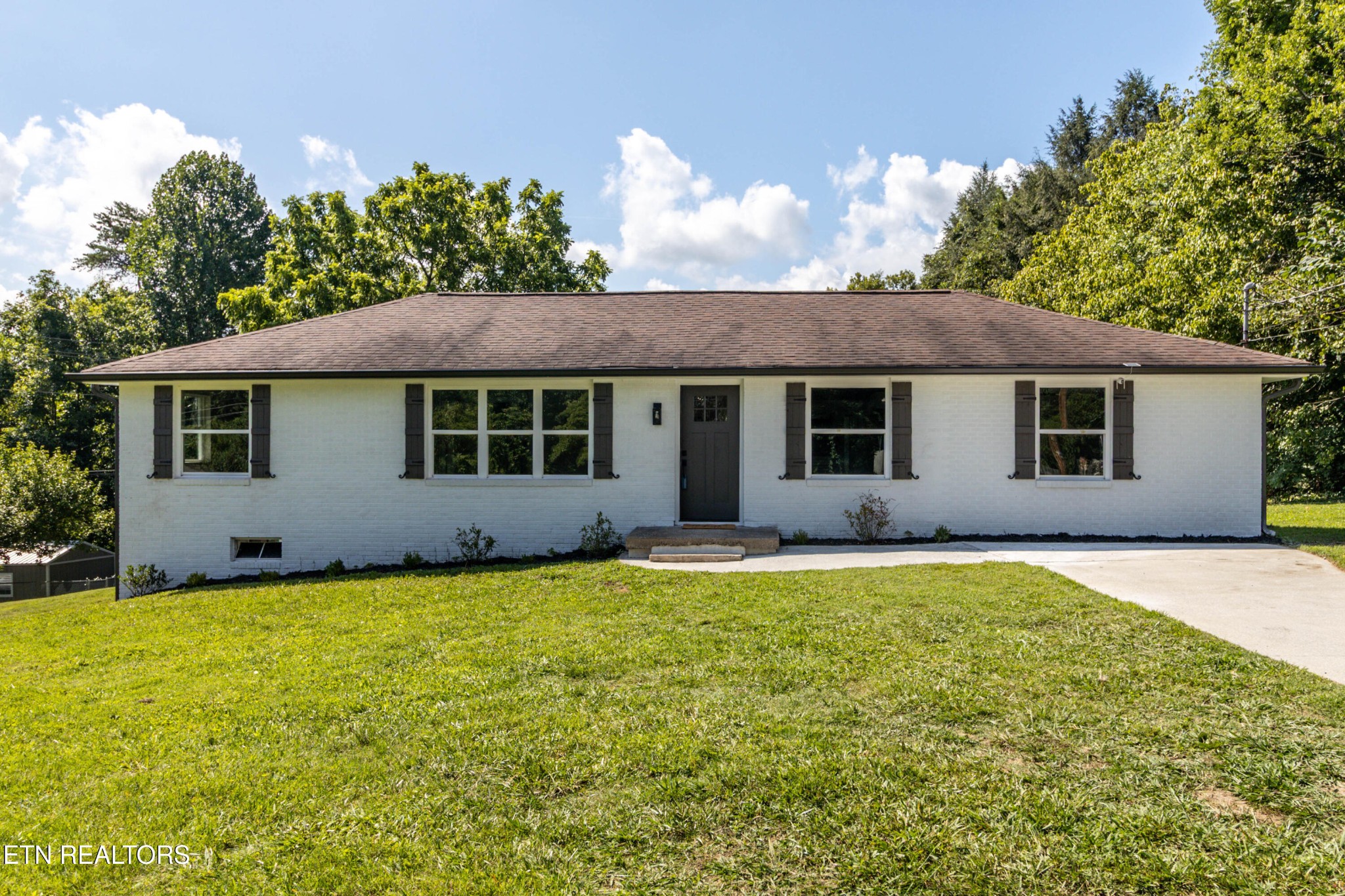 505 Foust Carney Road Powell, TN 37849 - Photo 37 of 40 a view of a house with a yard