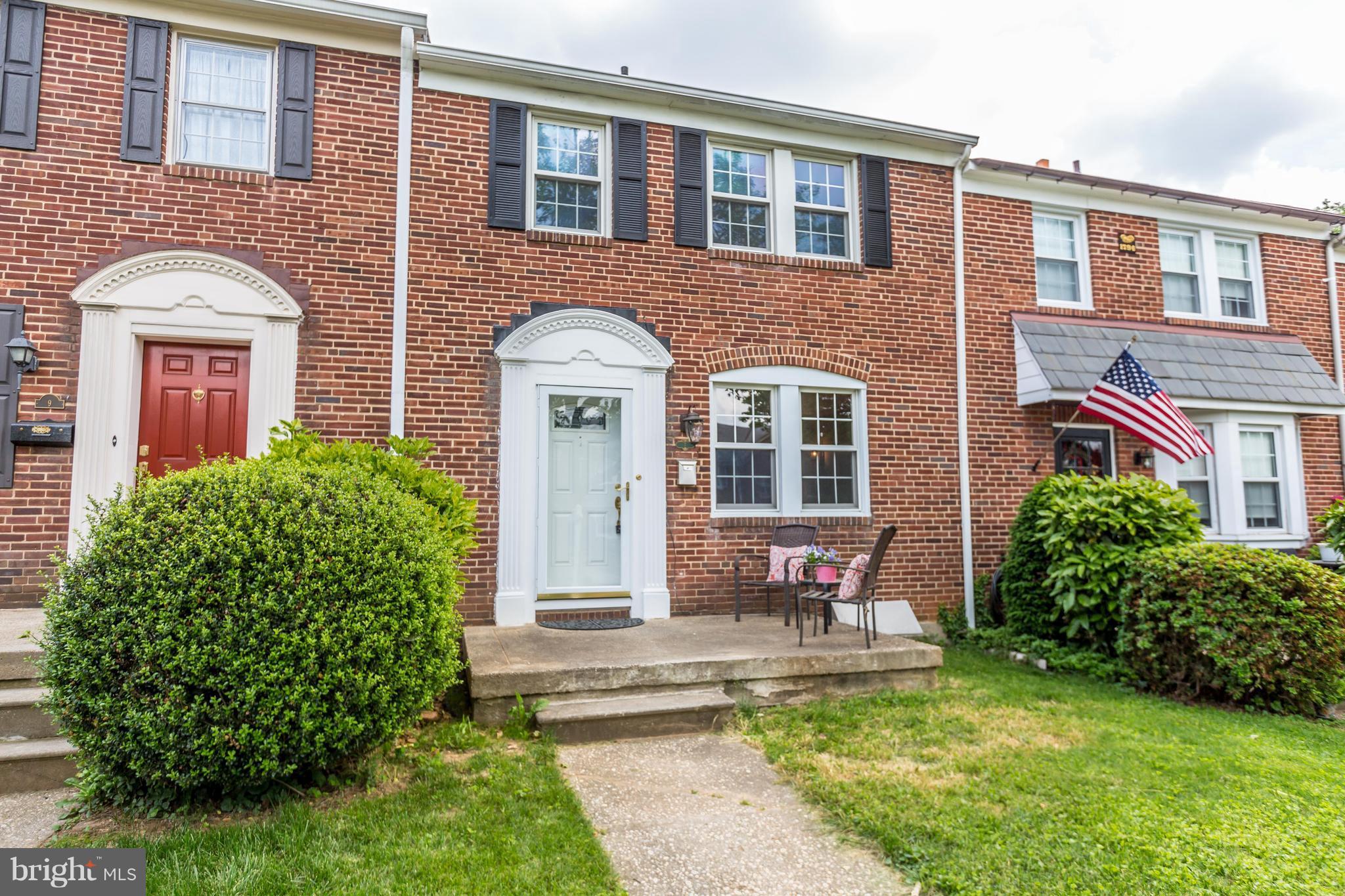 7 Murdock Road Baltimore, MD 21212 - Photo 1 of 30 a front view of a house with garden
