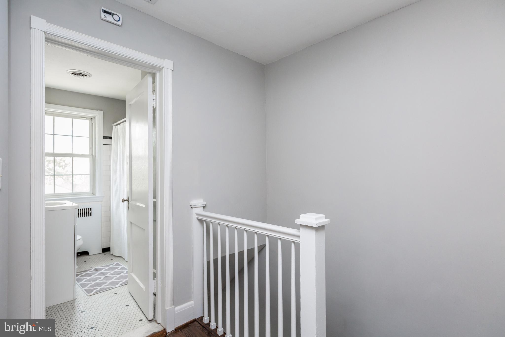 7 Murdock Road Baltimore, MD 21212 - Photo 18 of 30 a view of a hallway with a livingroom and a bathroom