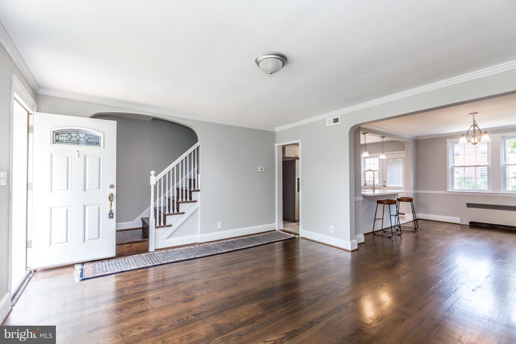 7 Murdock Road Baltimore, MD 21212 - Photo 4 of 30 a view of empty room with wooden floor and fan