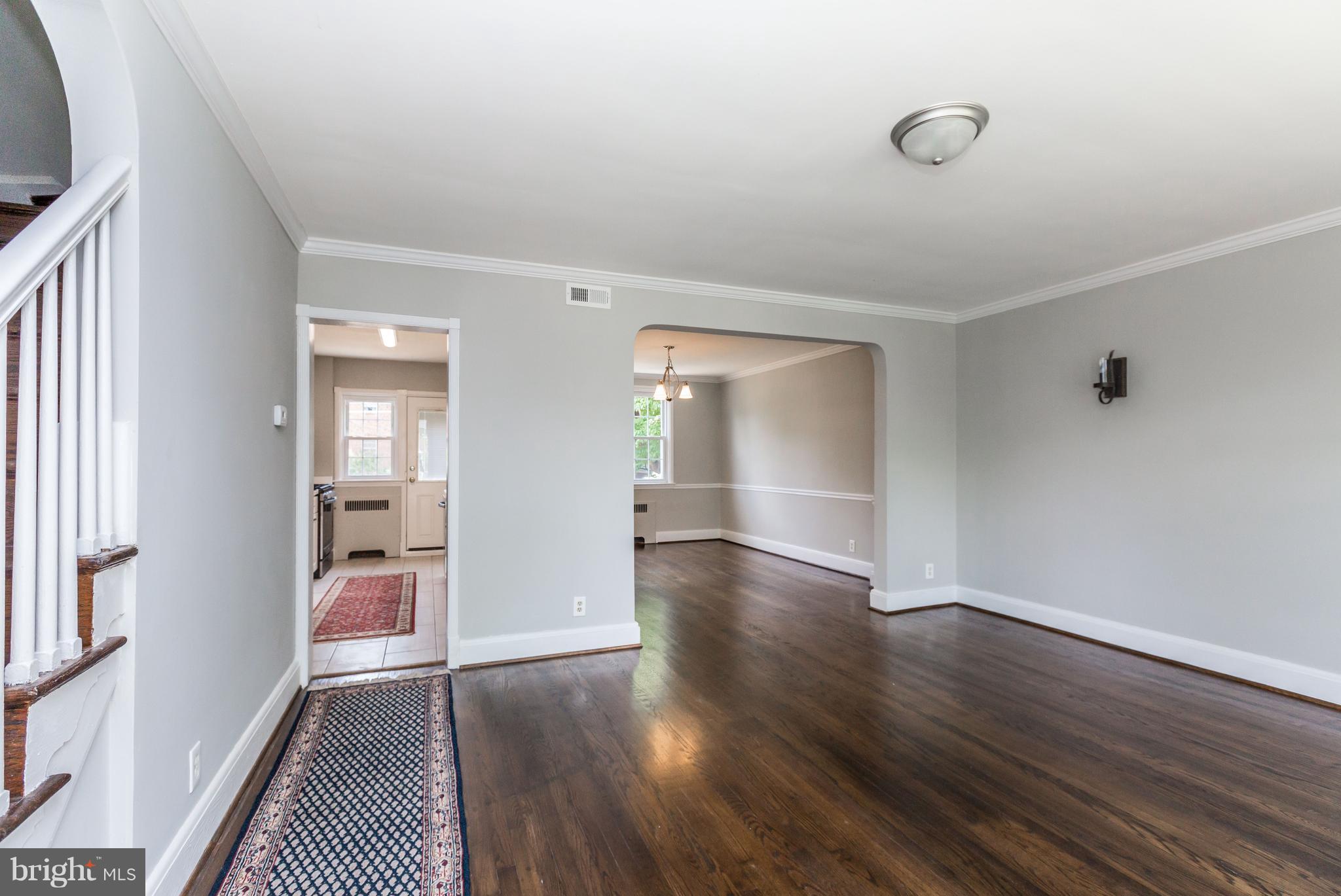 7 Murdock Road Baltimore, MD 21212 - Photo 5 of 30 wooden floor in an empty room with a window