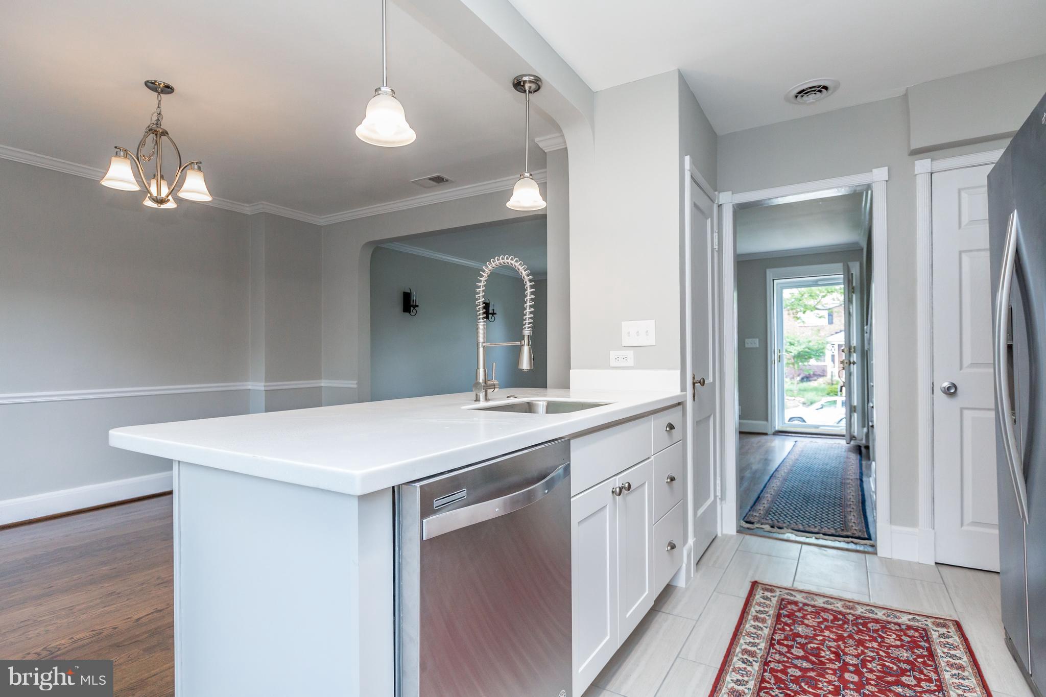7 Murdock Road Baltimore, MD 21212 - Photo 10 of 30 a bathroom with a sink a light fixture and a mirror