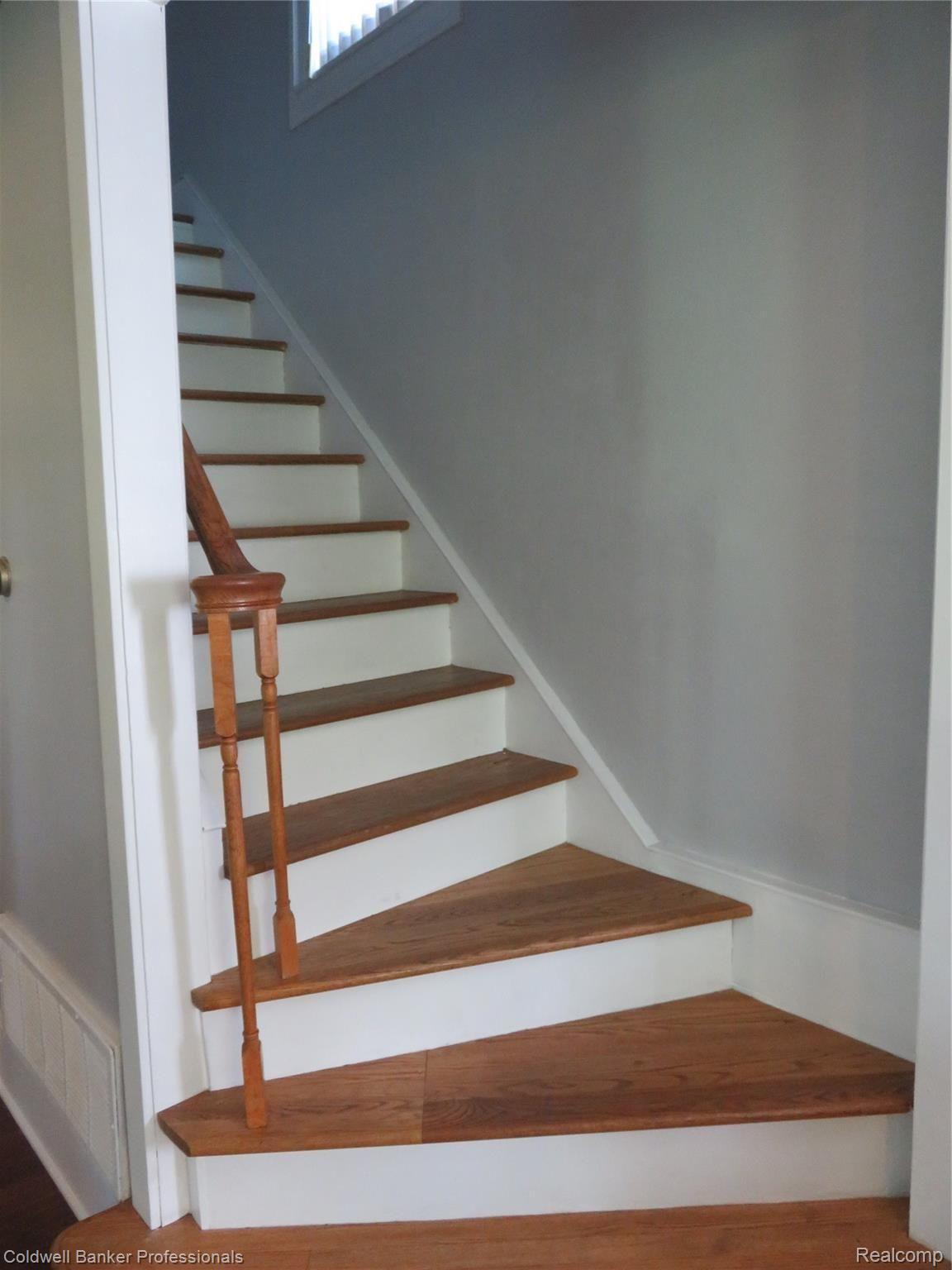 1820 South Morrice Road Owosso, MI 48867 - Photo 10 of 33 11 1820 staircase.JPG