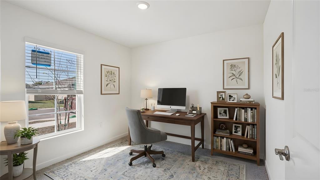 4706 Kona Circle Spring Hill, FL 34608 - Photo 10 of 18 a view of a workspace with a window and chair