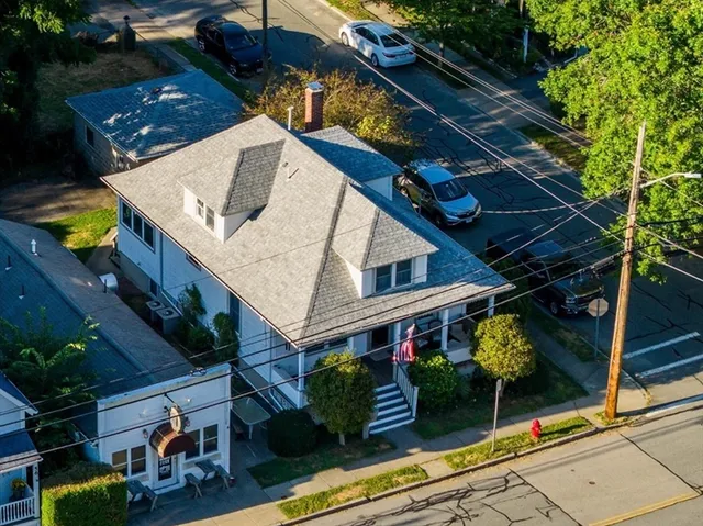 a view of sitting area in front of house