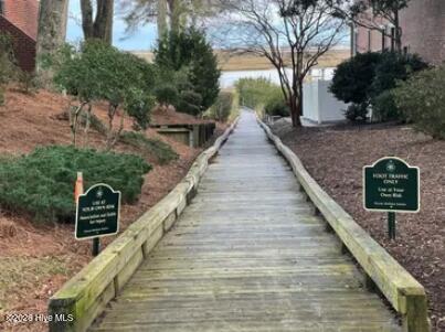 1254 Harbour Gate S Southwest Calabash, NC 28467 - Photo 3 of 5 Ocean Harbour Estates walking path to the community pier located along the Intracoastal Waterway.